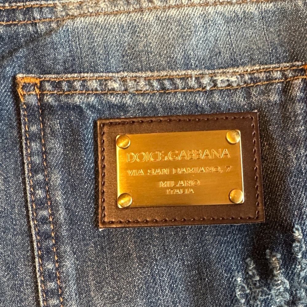Dolce & Gabbana Distressed Denim Jeans with Gold Accent
